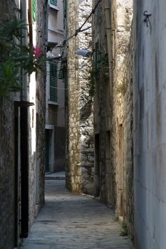 Narrow and old street in Sibenik, Croatia
