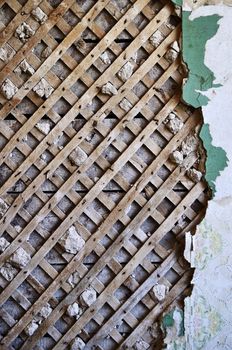 Grunge lath and plaster background on old destroyed wall