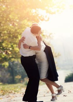 Young couple is embracing in nature