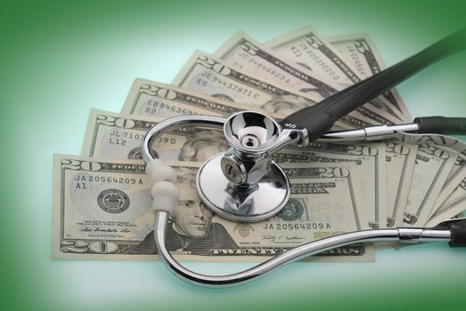 Money and stethoscope to illustrate the cost of health care