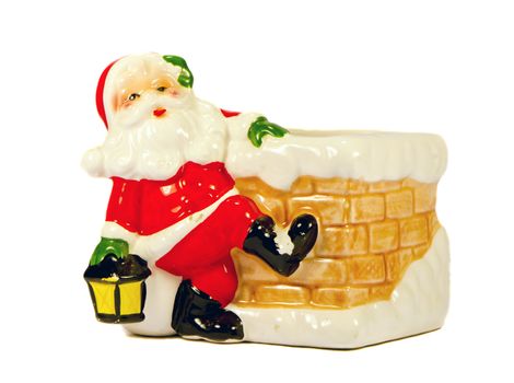 Ceramic clay toy Santa Claus. Christmas gift symbol.