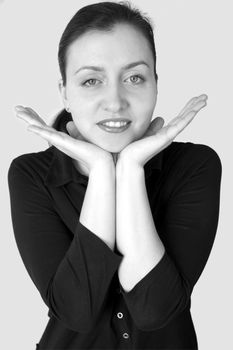 The beautiful woman. Hands near the face.