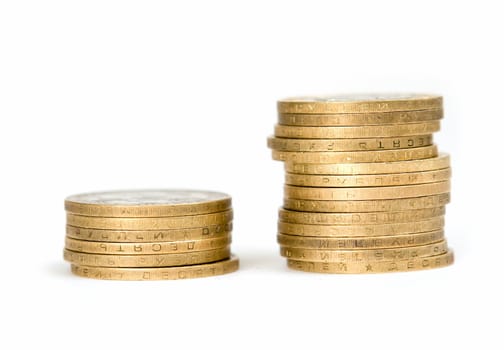 Columns of coins on a white background