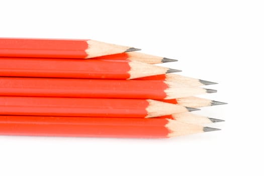 Stationery. The sharpen pencils on a white background.