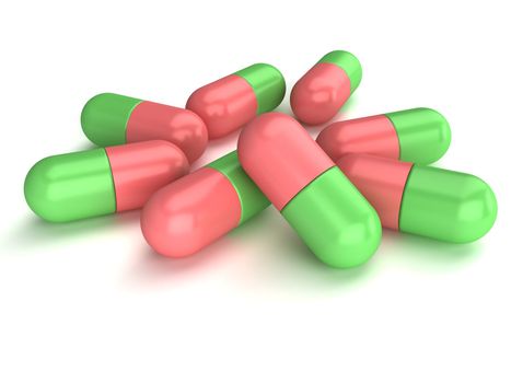 Some medical capsules on a white background