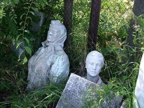 Fragments of destroyed agitation sculpture stocked on backyard.