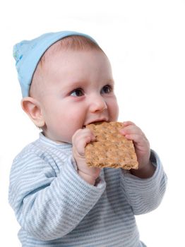 child eats chunky cookie,tasty and pleasing meal