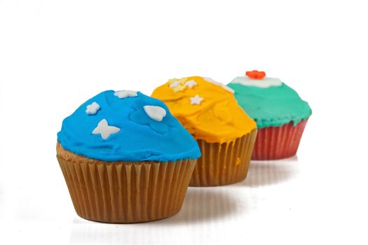 Home made cupcakes in delicious colors