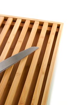 Bread chopping board made from bamboo with knife 