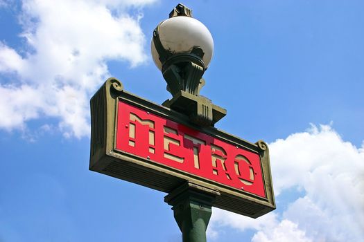 Ancient Metro Sign at the entrance of the Paris Metro