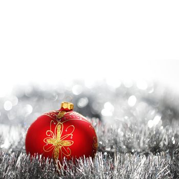 red christmas ball on holiday background