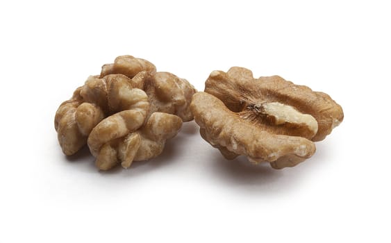 Two pieces of walnut on the white background