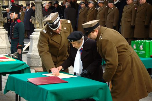 WROCLAW, POLAND - DECEMBER 2: Polish army, engineering training center for troops receives new army banner. Officer blesses new banner on December 2, 2011.