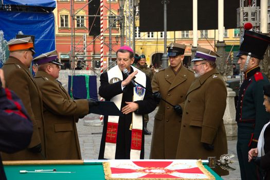 WROCLAW, POLAND - DECEMBER 2: Polish army, engineering training center for troops receives new army banner. Cardinal blesses new banner on December 2, 2011.