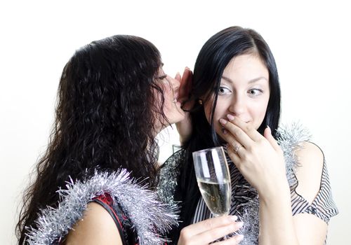 two girls gossiping at the party