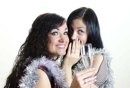 two girls gossiping at the party