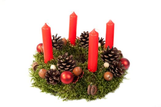 traditional home made advent wreath isolated on the white background.