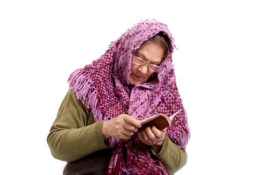 Old woman read book over white background