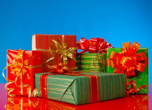 Christmas presents against blue background