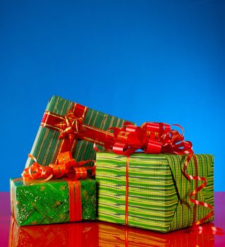 Christmas presents against blue background