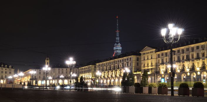 Piazza Vittorio in Turin, Italy, at night with Mole in the back