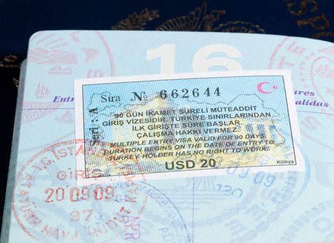 Macro image of visa and immigration stamps in US passport for Istanbul Turkey