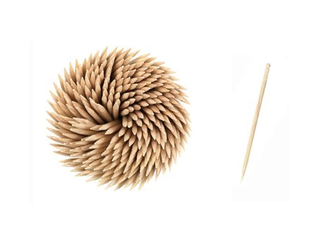 A close up shot of a wooden toothpicks on white