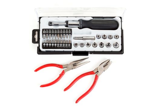 Screwdriver Bit Set on white background with pliers