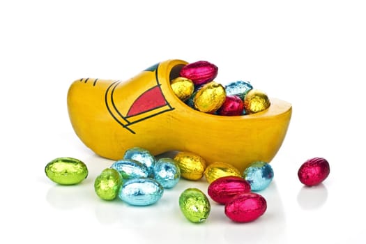 Traditional dutch wooden clog with little colored eggs