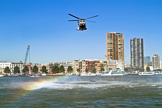 ROTTERDAM, NETHERLANDS - SEPTEMBER 09: Army helicopter is picking up a drowning man during the world harbor days on 9 september 2012 Rotterdam the Netherlands