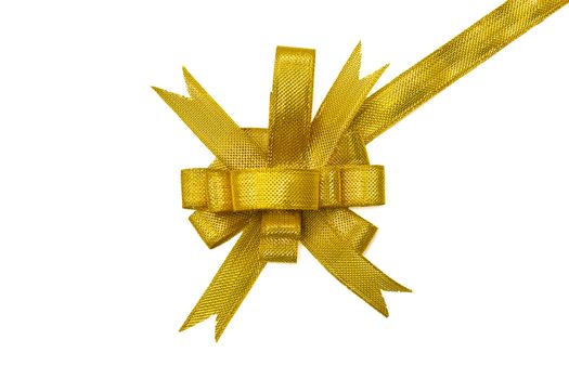 Golden gift bow. Ribbon on white background