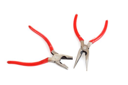 two different red pliers isolated on white