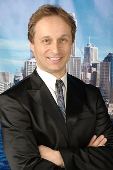 portrait of middle age businessman in austere suit