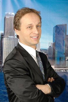 portrait of middle age businessman in austere suit
