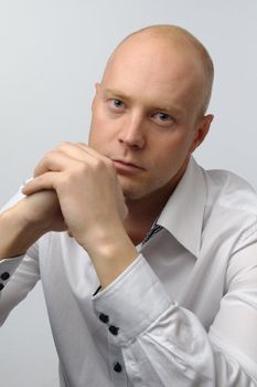 portrait of middle age businessman in austere suit