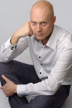 portrait of middle age businessman in austere suit