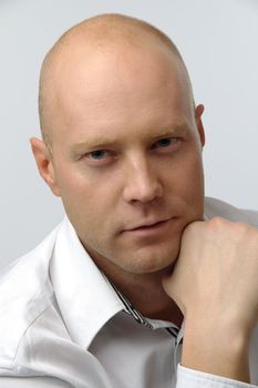 portrait of middle age businessman in austere suit