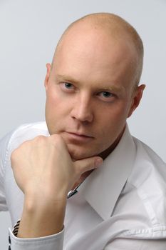 portrait of middle age businessman in austere suit