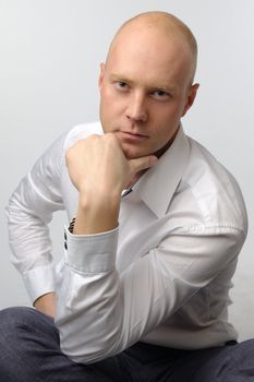 portrait of middle age businessman in austere suit