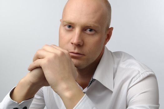 portrait of middle age businessman in austere suit