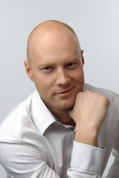 portrait of middle age businessman in austere suit