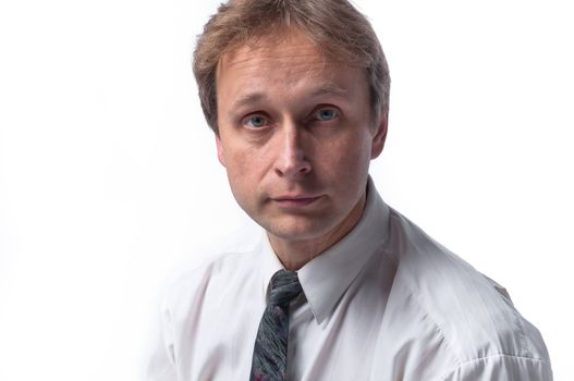portrait of middle age businessman in austere suit