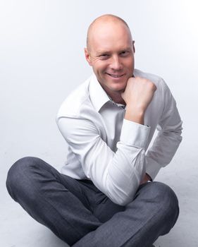 portrait of middle age businessman in austere suit