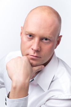 portrait of middle age businessman in austere suit