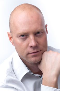 portrait of middle age businessman in austere suit