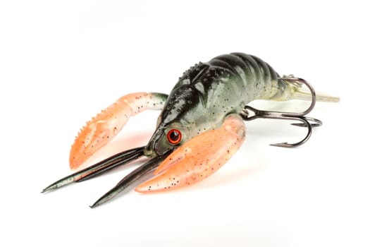 rubber artificial crab bait to catch black bass with a white background Horizontal