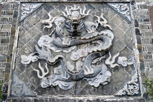 Chinese ancient rock art of dragon carvings