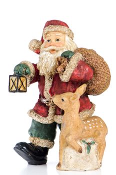 Ceramic Santa Claus isolated on white background.