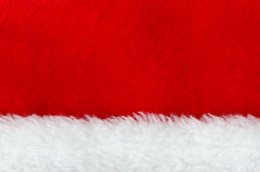 Red and white fur. Part of Santa' s clothing.