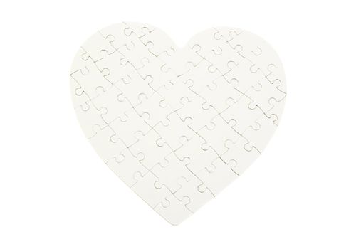 white jigsaw puzzle heart shape on white